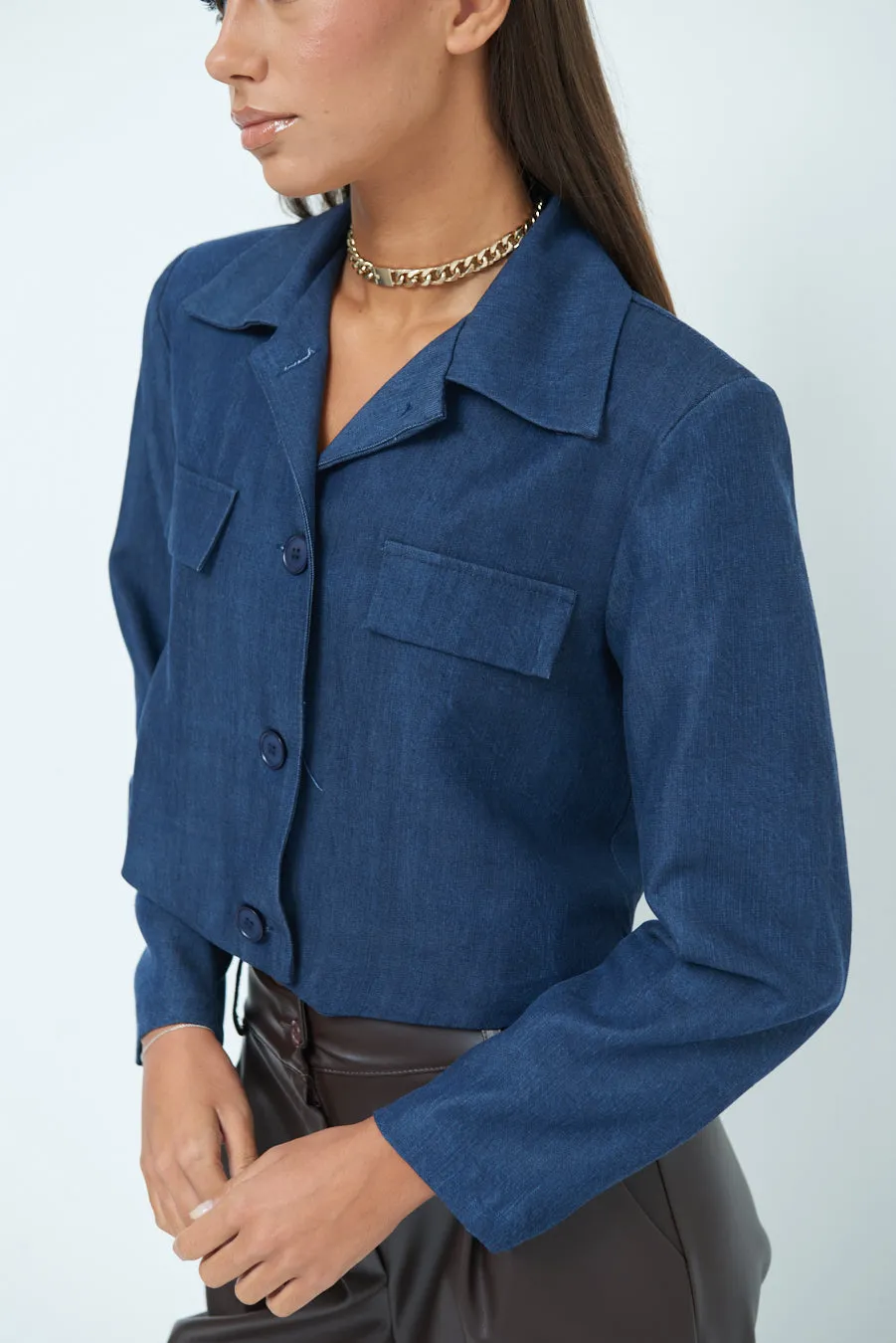Classic cropped denim jacket with button-up closure wholesale
