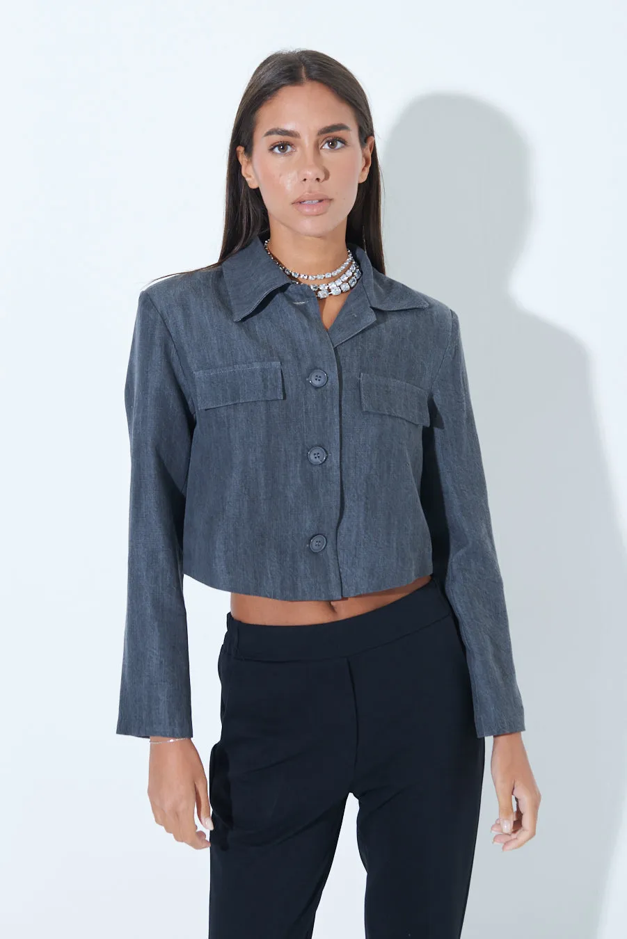 Classic cropped denim jacket with button-up closure wholesale