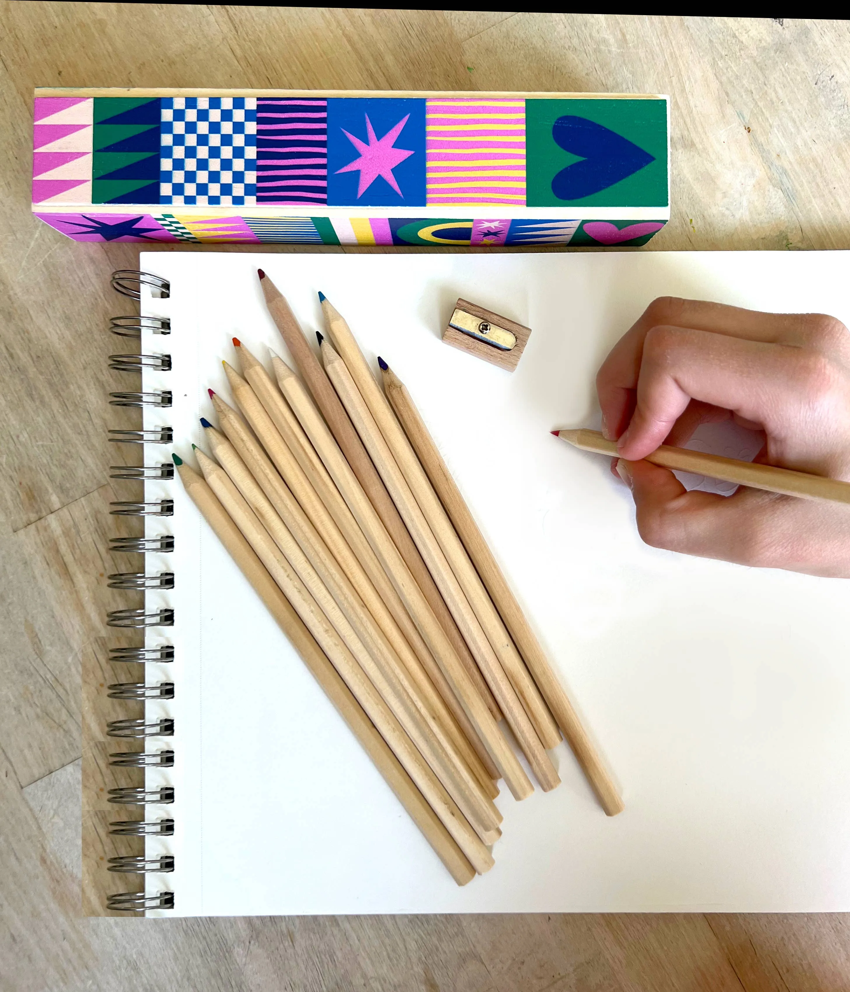 geo love pencil box   colored pencils