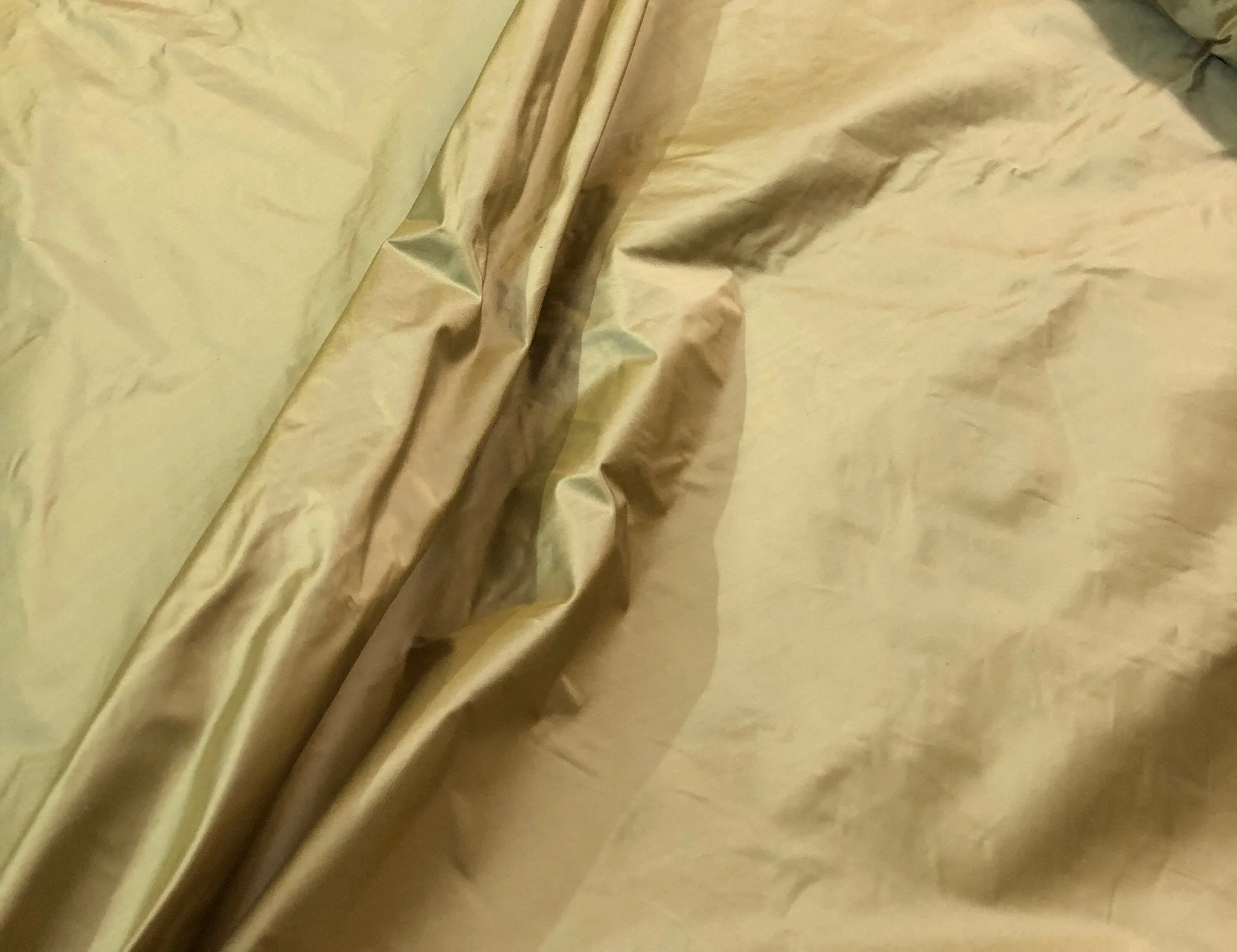 Gold silk taffeta 54&quot; wide   Beautiful iridescent gold color silk taffeta fabric sold by the yard